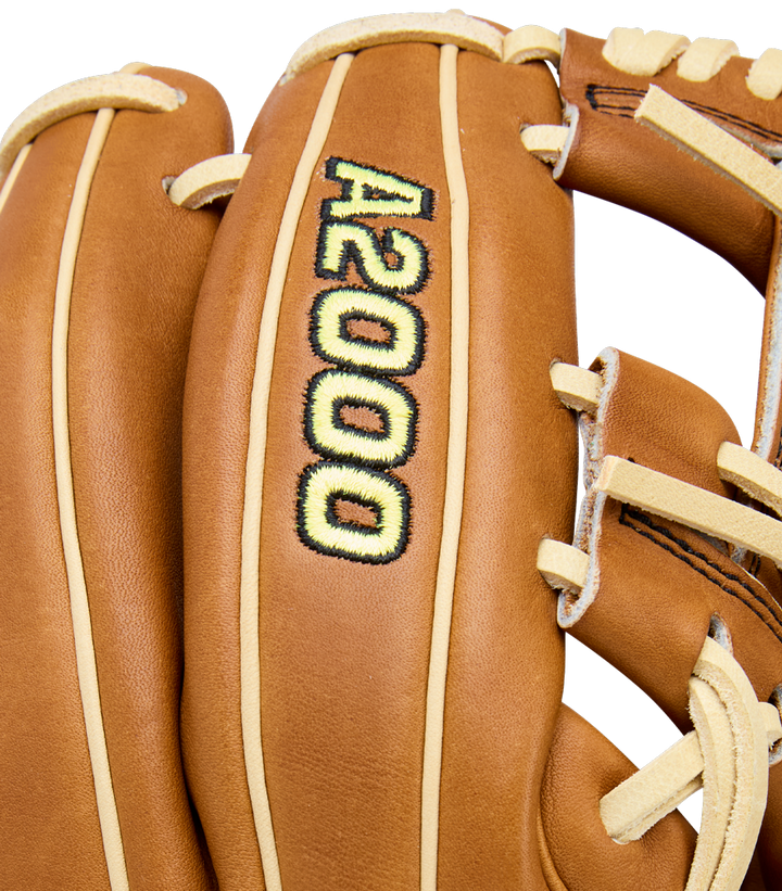 A close-up of a Wilson A2000 DP15 11.5" Baseball Glove (WBW104111115) with Pro Stock Leather, beige lacing, and black and yellow A2000 embroidery on the back.