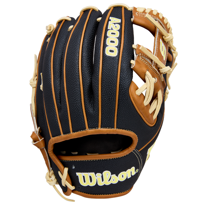 A black and tan Wilson A2000 1975SS 11.75" baseball glove with cream laces, crafted with SuperSkin, features the Wilson brand and model number WBW1041121175 on the back.