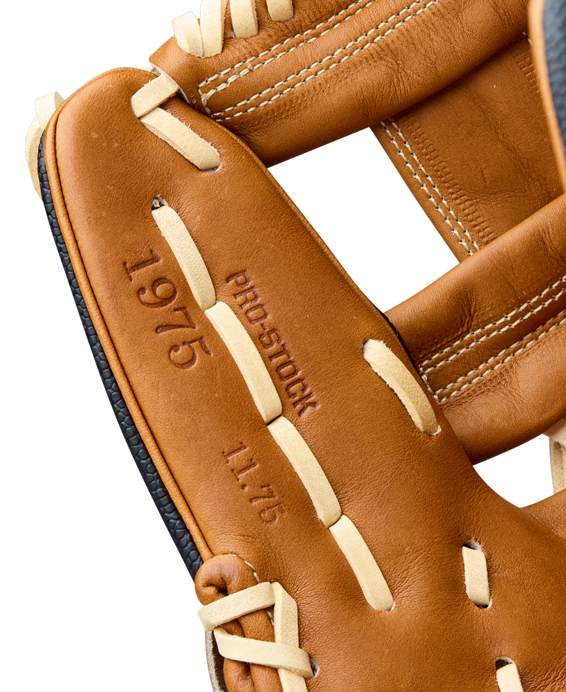 Close-up of a Wilson A2000 1975SS 11.75" Baseball Glove (WBW1041121175) with brown leather, light tan laces, and embossed details including "PRO STOCK," "11.75," and "1975" on the glove.