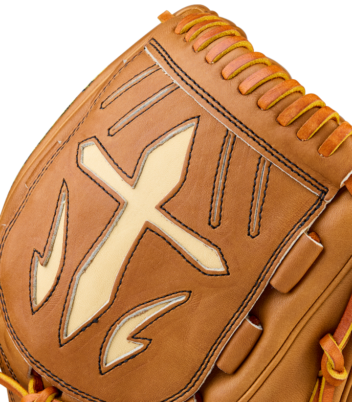 Close-up of a Wilson A2000 B23 12" Baseball Glove (WBW10411712), crafted from Pro Stock Leather in brown with cream and black stitched designs, a prominent cross, and unique decorative accents on the glove’s surface.