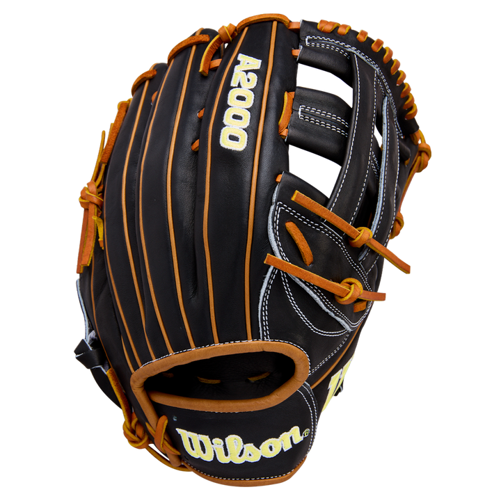 A black Wilson A2000 1750 12.5" Baseball Glove (WBW104121125) with tan laces and white stitching is displayed at an angle on a white background. The Wilson logo appears on the wrist strap, and the model number is stitched on the back.