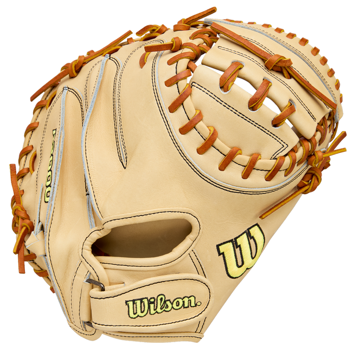 The Wilson A2000 PF33 33" catcher's mitt, crafted from Pro Stock Leather, features a tan design with brown laces, black stitching, and the Wilson logo in yellow and black on the thumb and wrist.