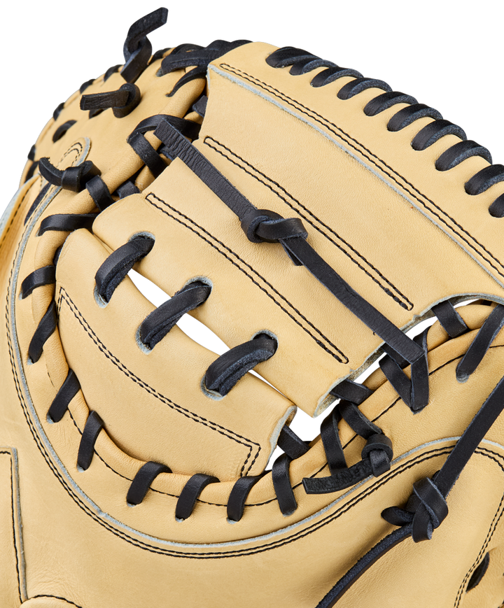 Close-up of a Wilson A2000 1734 34" Baseball Catcher's Mitt (WBW10412934), featuring tan Pro Stock leather with black laces, intricate stitching, and webbing—ideal for catchers seeking premium Wilson performance.