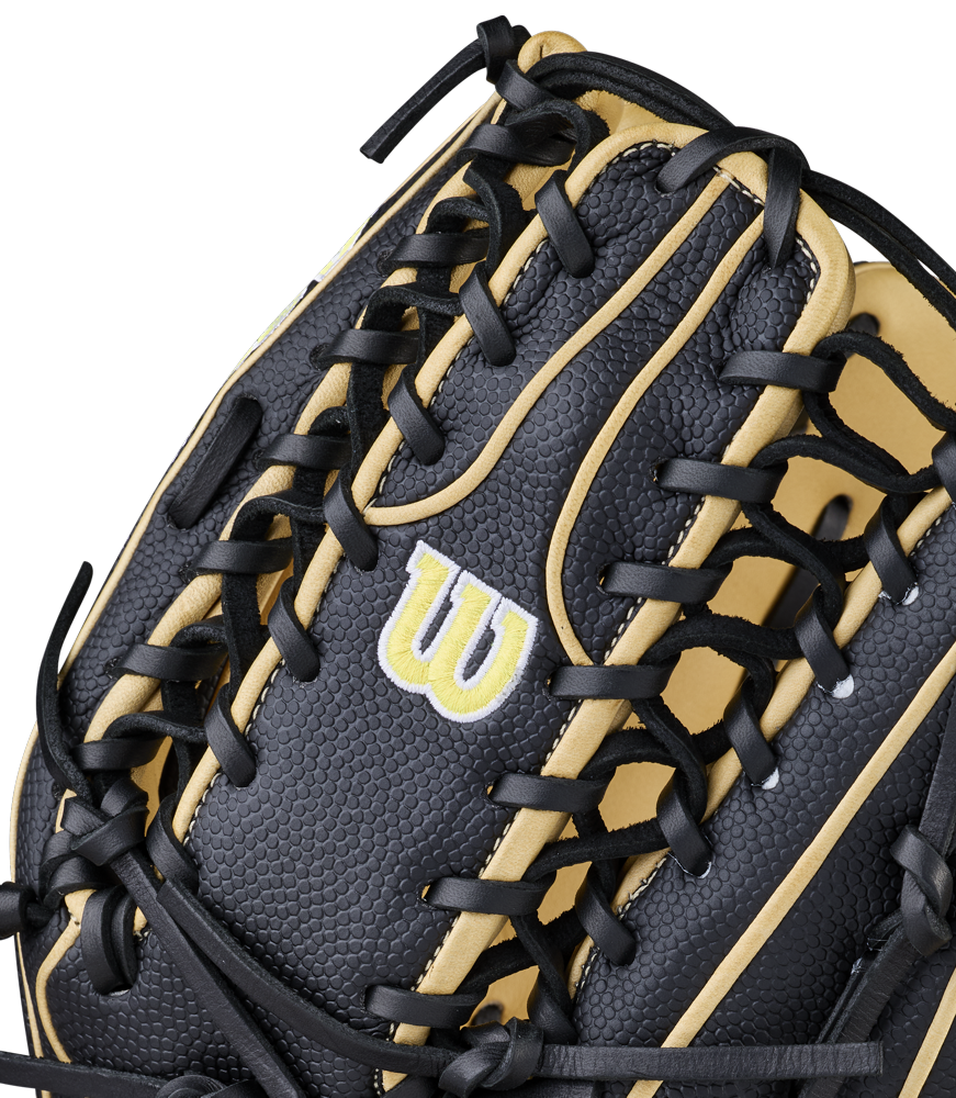 Close-up of the Wilson A2000 OT7SS 12.75" Baseball Glove (WBW1041831275), featuring black and tan textured leather, detailed stitching, black laces, and Wilson’s yellow and white embroidered W logo.