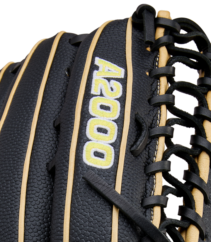 Close-up of a Wilson A2000 OT7SS 12.75" baseball glove (model WBW1041831275) in black with tan laces, featuring "A2000" embroidered in white and yellow on the leather.