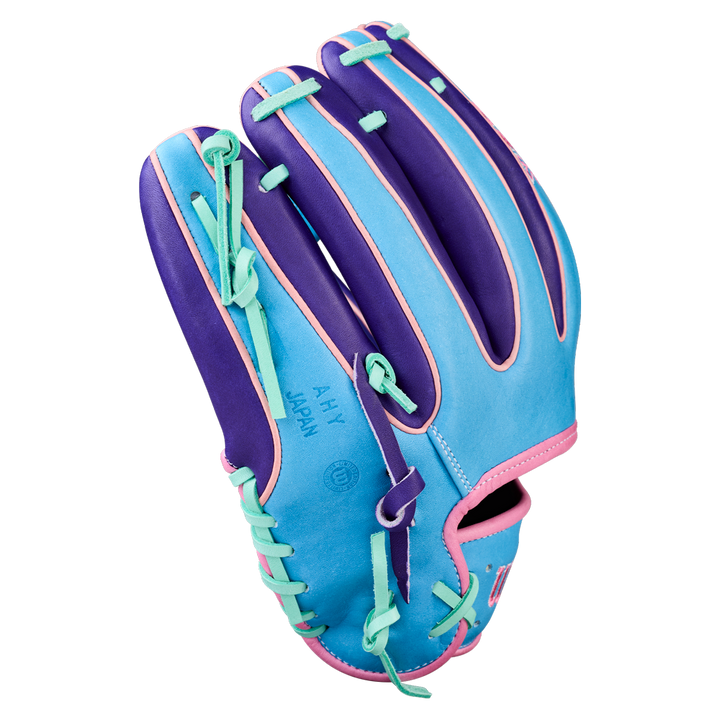 The Wilson A2K 1720 11.5" Baseball Glove - GOTM October 2025 features bright blue, purple, pink, and teal accents. Shown palm-side up on a plain white background with visible finger slots.