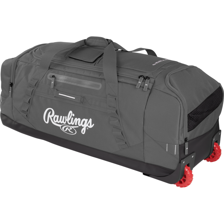 The Rawlings Yadi 2 Wheeled Catcher's Bag (YADI2WHBG) is a large gray equipment bag with black accents, a top handle, multiple zippered compartments, and two red wheels on one end for easy rolling.