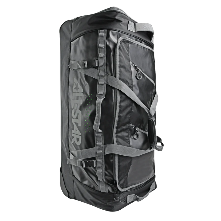 The All Star S7 Elite Catcher's Roller Bag: BB-S7E-RB is a large black gear bag with gray straps, multiple zippered pockets, and "ALLSTAR" boldly printed on the side, designed for heavy use and maximum durability.