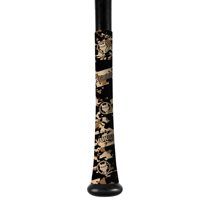 A close-up of a black bat handle wrapped in VukGripz Bat Grip Tape by VukGripz, featuring a camouflage pattern and circular logo for optimal grip. The handle is visible at the top and bottom.
