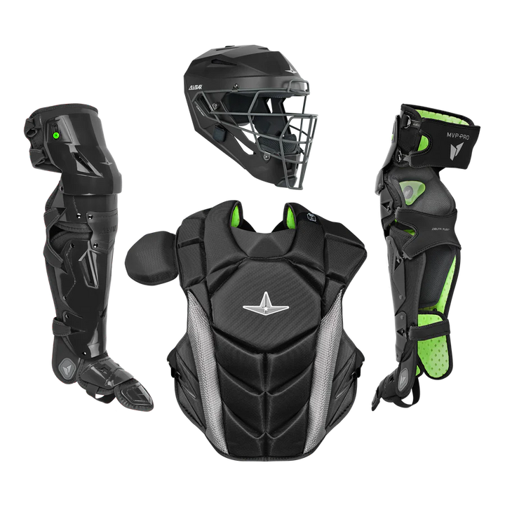 The All Star MVP Pro Catcher's Leg Guards: LG-5 by All Star feature a black and green design with a pivoting hinge system for enhanced one knee down protection, shown with a helmet and chest protector on a plain white background.