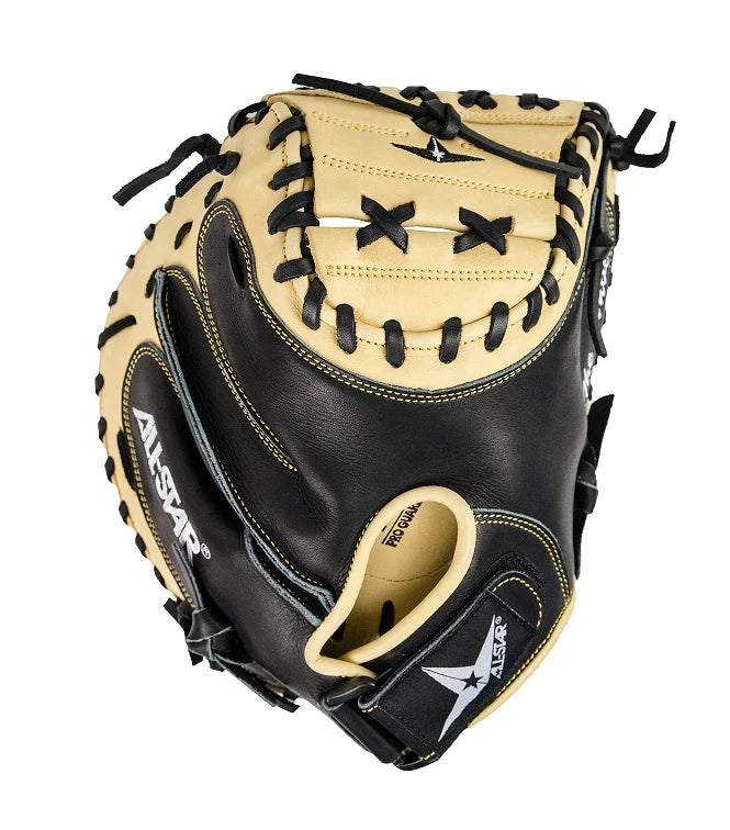 The All Star ANVIL 33.5" Weighted Training Mitt (CM3500TM) features black and tan leather, visible stitching and lacing, plus the All Star logoβperfect for improving your skills with quality baseball training gear.