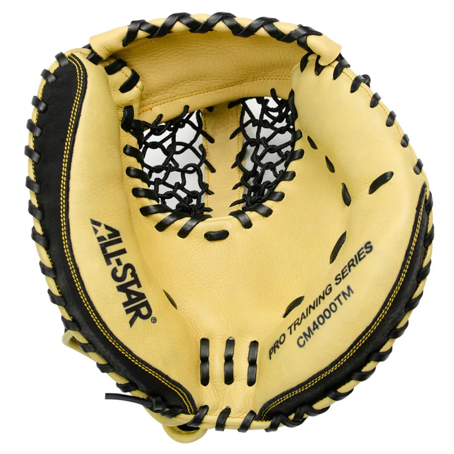 The All Star KEYHOLE 33.5" Training Mitt (CM4000TM) features a tan and black design with black laces and is perfect for developing pocket awareness.