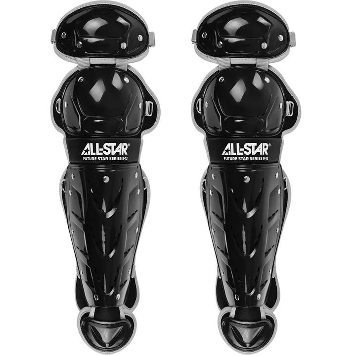 A pair of black All Star Future Star Series catcher's shin guards with silver rivets, part of the youth CK-FS2 kit, designed for leg protection during games and shown against a white background.