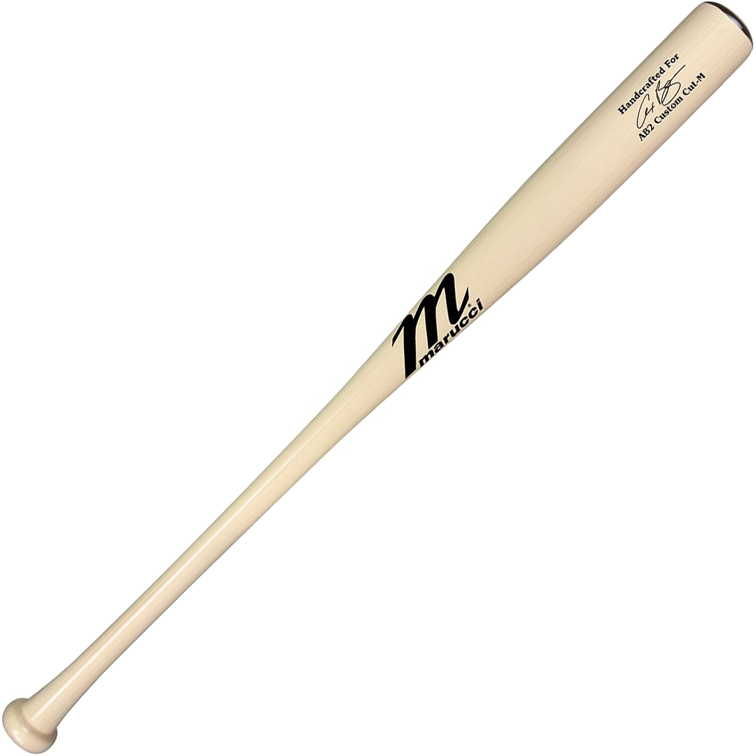 A light-colored Marucci AB2 Alex Bregman Pro Exclusive maple wood bat, featuring the Marucci logo and branding near the barrel, with a player's signature and "Handcrafted for" printed above it.