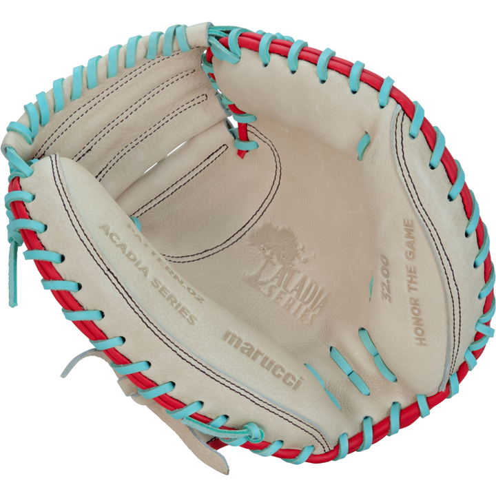 A beige Marucci Acadia 220C1 32" catcher's mitt with blue and red laces, made of full-grain cowhide leather, features "HONOR THE GAME," palm detailing, ACADIA SERIES markings, and detailed stitching inside. Brand: Marucci.