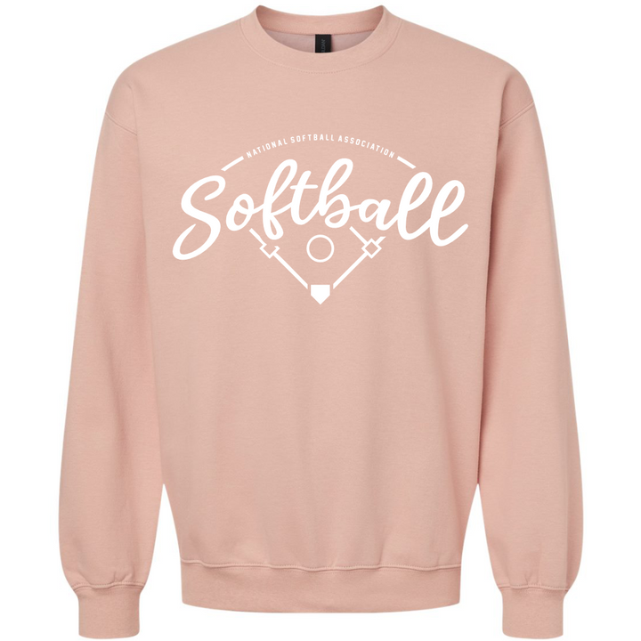 The NSA Vintage Softball Crewneck Sweatshirt by DSG Apparel features "Softball" and "National Softball Association" in white above a softball field graphic on light pink, made from cozy ring spun cotton.