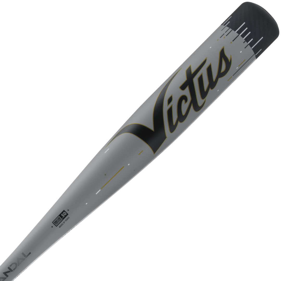 A close-up of a silver 2024 Victus Vandal Lev3 (-3) BBCOR Baseball Bat: VCBV3 (USED) with black and gold accents, showing the Victus brand name boldly on the barrelβideal for boosting your swing speed.
