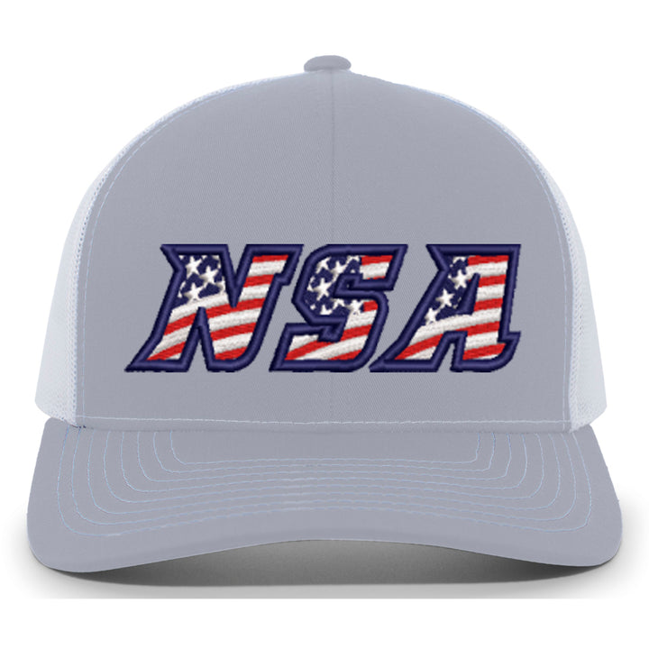 The NSA Flag Series Heather Snapback Hat (104S-HEWH) by Pacific Headwear is a light gray and white cap featuring "NSA" embroidered in bold with an American flag pattern on the front.