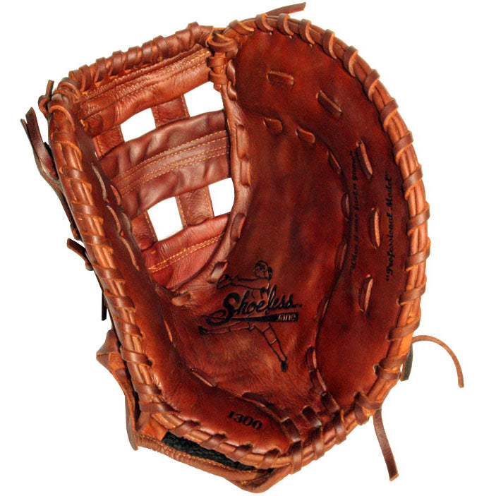 A worn brown leather Shoeless Joe 13" Fastpitch First Base Mitt (1300FPFB) with visible laces and the Shoeless Jane logo printed inside the palm.