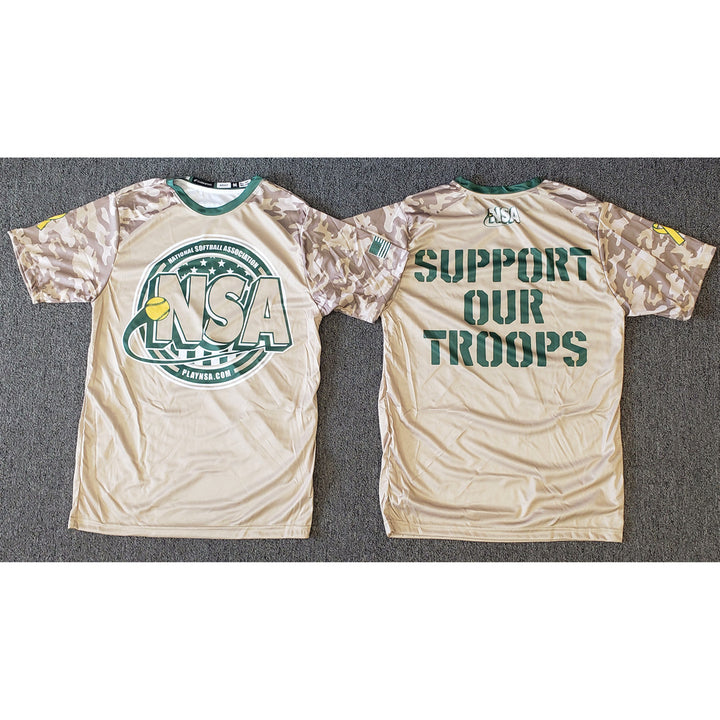 The DSG Apparel National Softball Association Support Our Troops sublimated short sleeve shirts feature a tan camo design, moisture-wicking fabric, a front NSA logo and website, "SUPPORT OUR TROOPS" on the back, and an American flag on the sleeve.