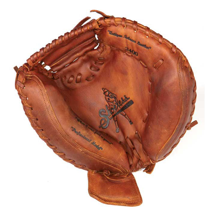 The Shoeless Joe 34" Baseball Catcher's Mitt: 3400CM features tobacco-tanned steerhide, visible stitching, and "Shoeless Joe" emblazoned on the palm—a classic mitt for catchers from the Shoeless Joe brand.