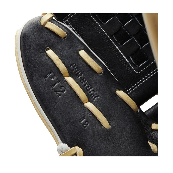 Close-up of a Wilson A2000 P12 12" Fastpitch Glove (WBW10043912) in black with tan laces, featuring "P12" and "PRO STOCK" embossed on the palm, white stitching, woven detailing, and Pro Stock leather construction.