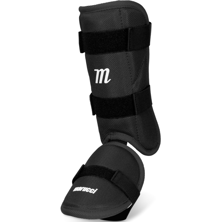 The Marucci Batter's Leg Guard: MPLG3 is a black leg guard with straps, offering an adjustable shin guard and extended ankle protection.