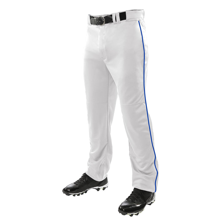 Wearing Champro Sports Triple Crown Open Bottom Baseball Pants with blue piping (BP91UA), a black belt, and black cleats, the person stands against a plain white background. The durable double knit polyester offers style and comfort.