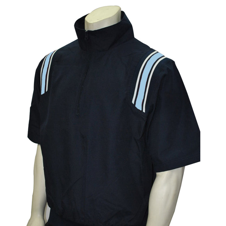 A mannequin is wearing the Smitty Short Sleeve Umpire Jacket (BBS-324) by Smitty, a black athletic half zip top with a front zipper and two light blue double stripes on each shoulder.