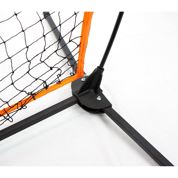 Close-up of the Bownet Big Mouth X 7' x 7' Training Net (BOWBMX) corner, showing heavy-gauge steel in the black frame and bright orange edge, secured by screws for quick setup. Brand: Bownet.