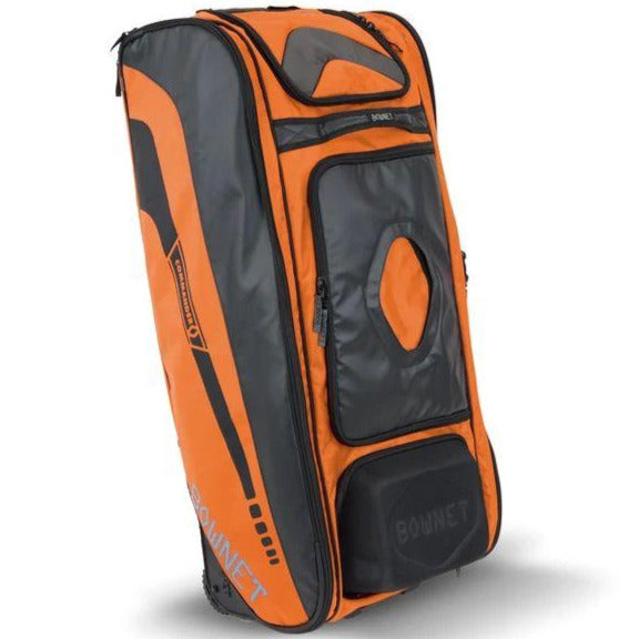 The Bownet Commander Wheeled Catcher's Bag (BN-COMMANDER BAG) is a spacious, sturdy orange and black sports bag with zippered compartments, carrying handles, and the Bownet logoâperfect for organizing catcherâs gear.