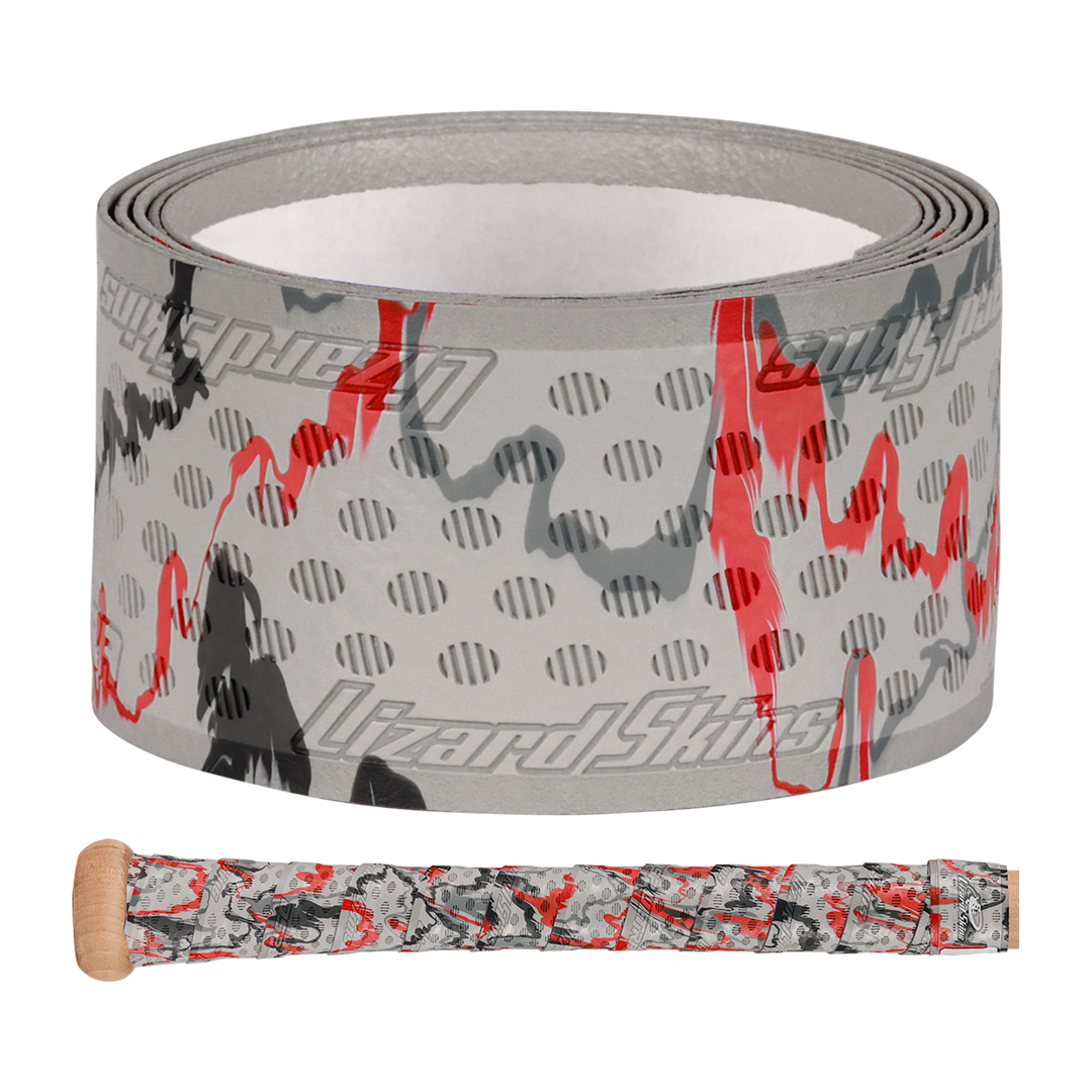 A Lizard Skins DSP Ultra Camo 1.1mm Bat Grip with gray, black, and red camouflage is displayed above a wooden baseball bat handle wrapped in the same Lizard Skins polymer grip.