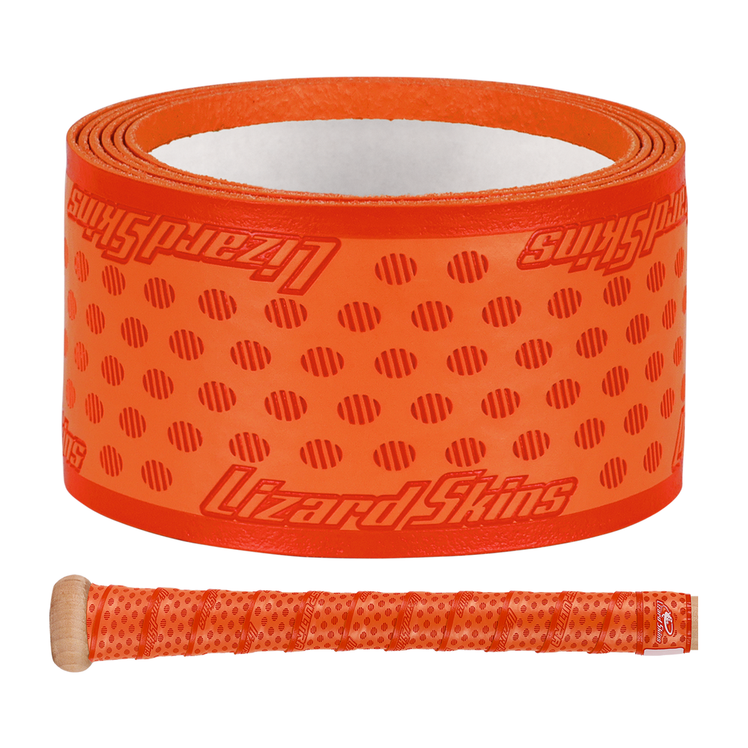 A Lizard Skins DSP Ultra Solid 1.1mm Bat Grip in orange with a dotted design and logo is displayed above a bat handle wrapped with the same Lizard Skins grip.