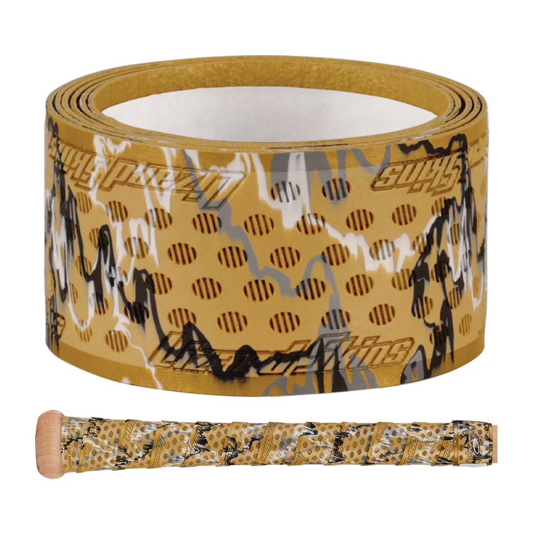 A rolled strip of Lizard Skins DSP Ultra Camo 1.1mm Bat Grip is shown above a wooden bat handle wrapped with the same Lizard Skins camouflage-patterned design.