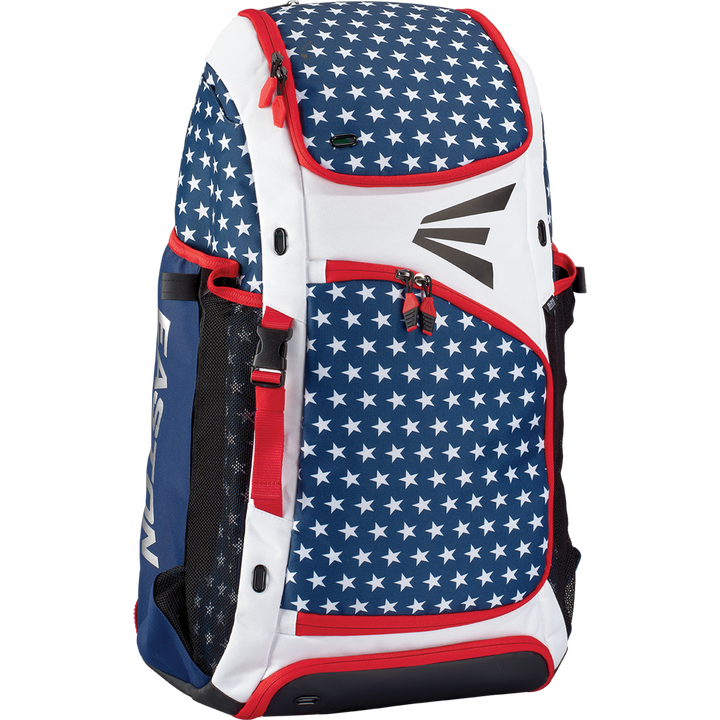 The Easton E610 Catcher's Backpack (E610CBP CATBP) features a blue background with white stars, red and white accents, black mesh side pockets, and a prominent Easton logo on the front.