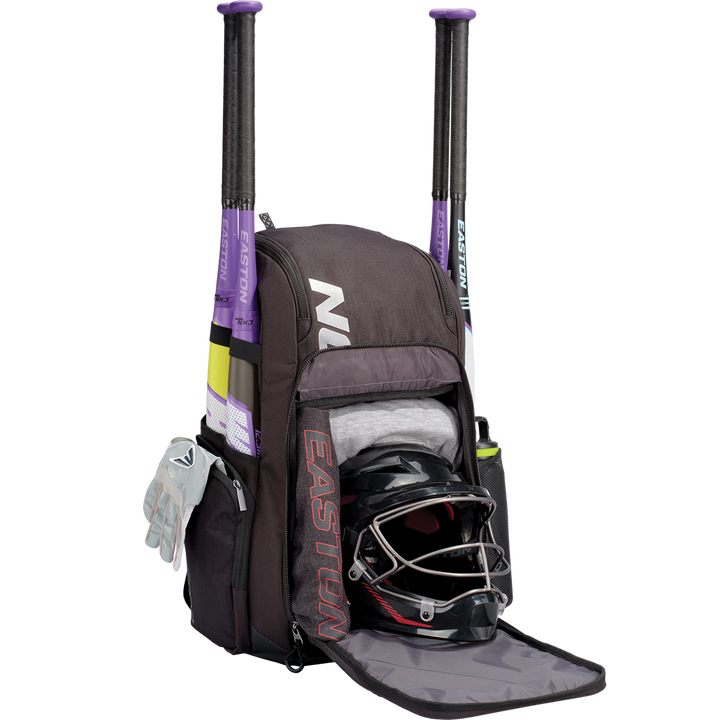 The Easton Roadhouse Backpack: EBA004 is shown in black, with two purple bats, gloves in the side pocket, a helmet with face guard, and a gray shirt in the main compartment—your perfect Easton slowpitch bat bag.