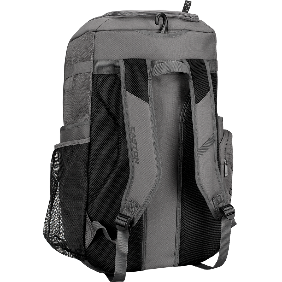 The Easton Roadhouse Backpack: EBA004 by Easton is shown from the back, featuring padded shoulder straps, mesh side pockets, and a small side zippered pocket. Its durable fabric and simple, functional design stand out.