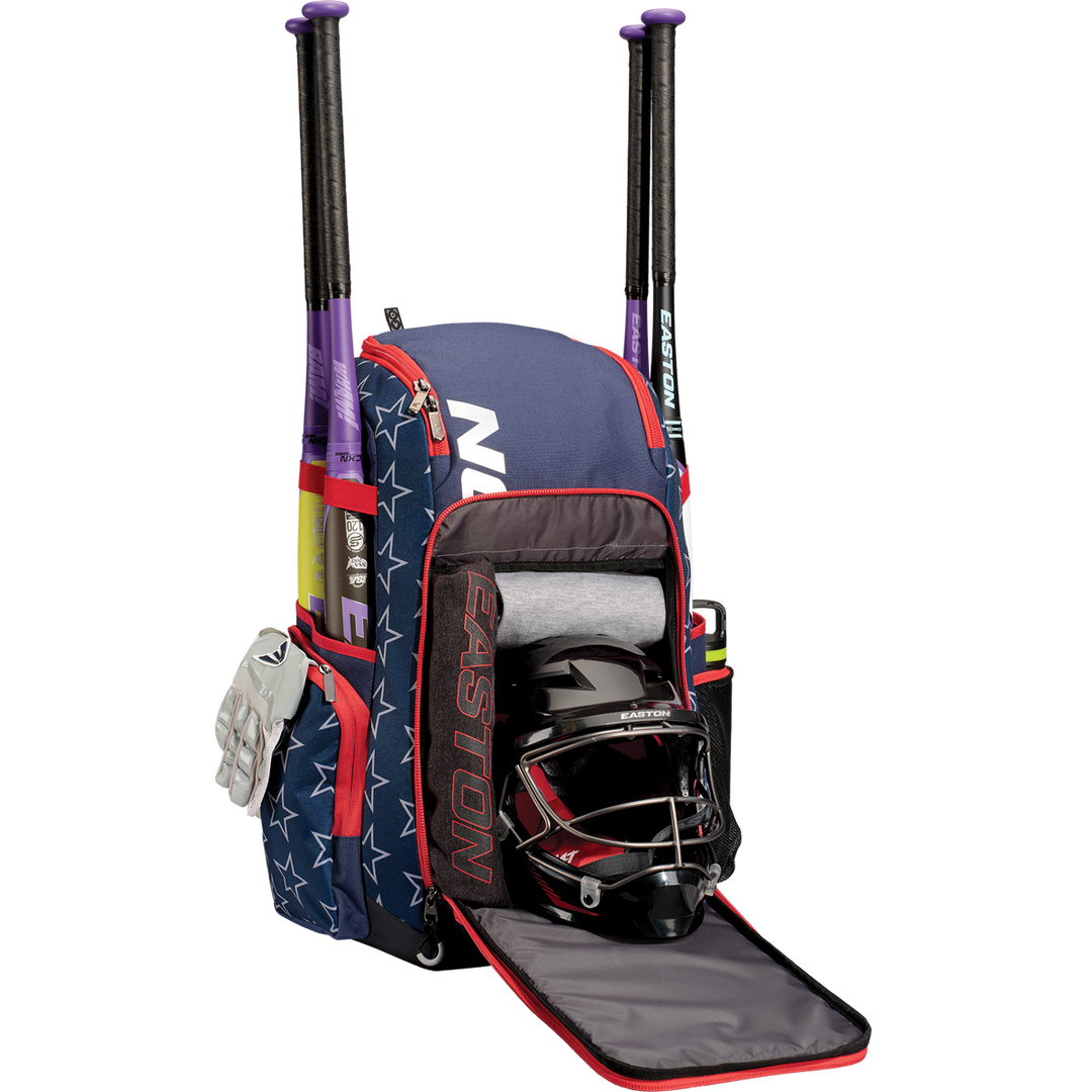 The Easton Roadhouse Backpack (EBA004) by Easton features a navy blue and red design with white stars, holds two bats, has a helmet and towel in the front pocket, and stores white gloves in the side pocket.
