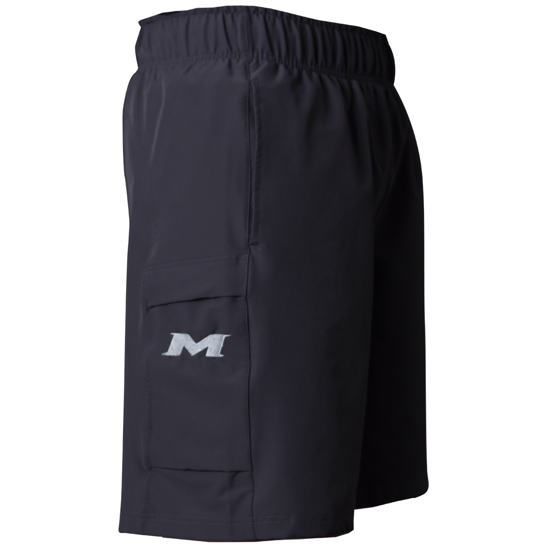 Side view of Miken Men's Slowpitch Shorts (MSPSM20) in black, featuring breathable poly-spandex, elastic waistband, and a side pocket with a white embroidered Miken 'M' logo.