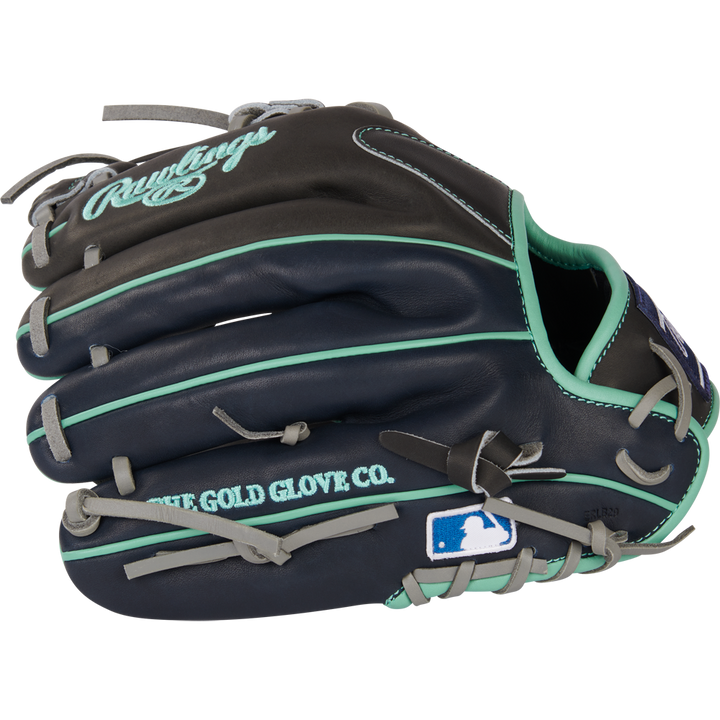 The Rawlings Heart of the Hide R2G 11.5" Baseball Glove (PROR204U-2DS) features dark blue and black leather with teal accents, THE GOLD GLOVE CO. on the side, and an MLB logo patch—ideal for serious infielders.