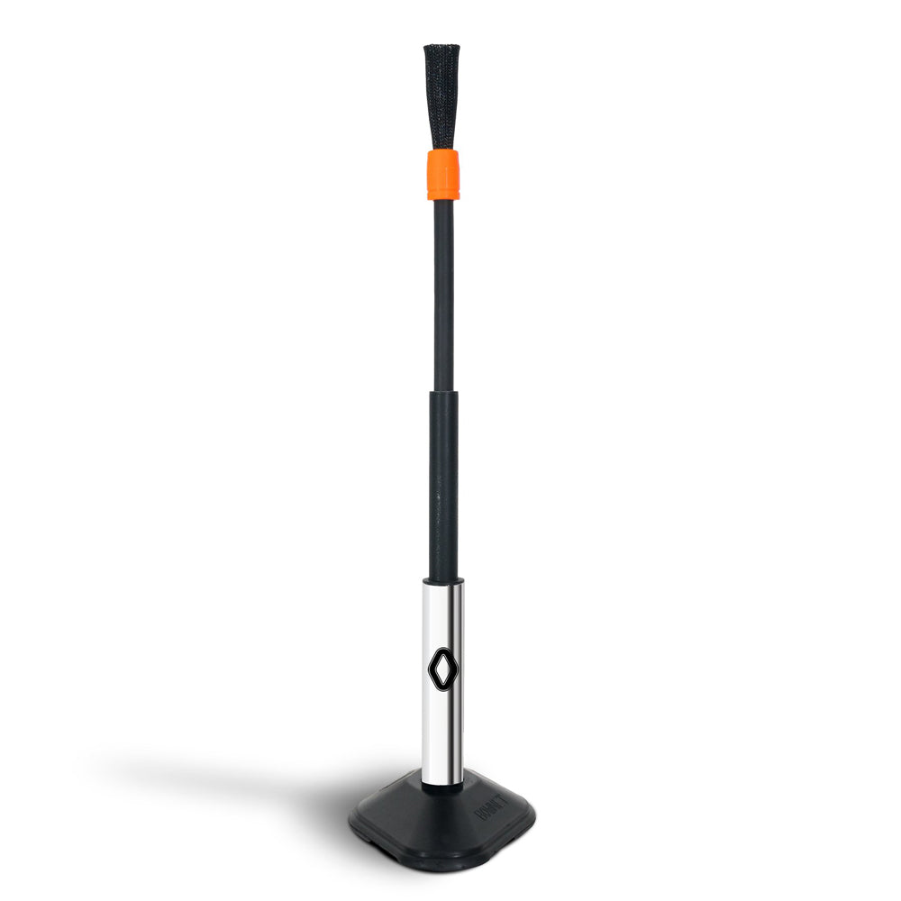 A black and silver grill cleaning brush with a long handle, orange accent, and rectangular base stands upright on a white background—its sturdy design recalls the durability of the Bownet ProMag Batting Tee by Bownet.