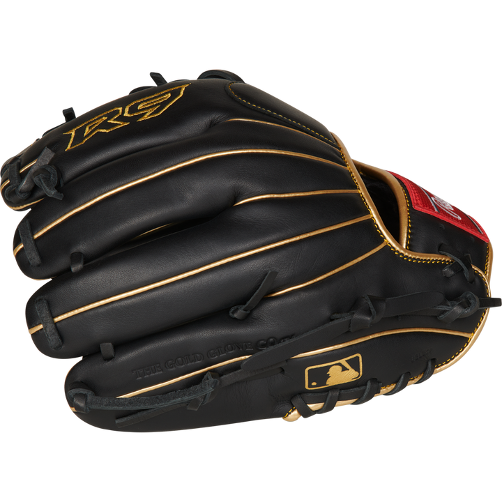 The Rawlings R9 11.5" Baseball Glove (R9204-2BG) features a black design with gold trim and stitching, an R9 logo on the thumb, MLB logo patch near the wrist, and is game-ready—perfect for young players.