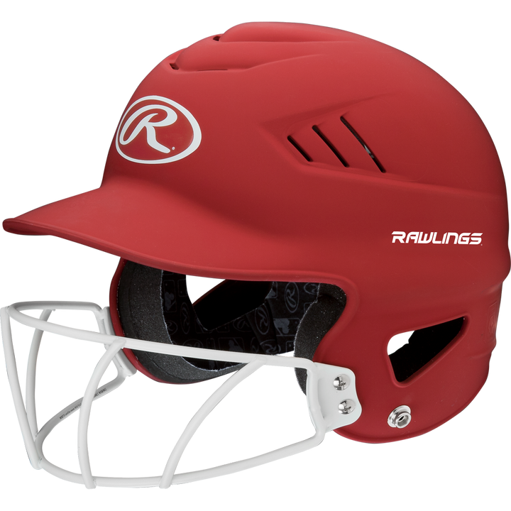 A Rawlings Coolflo Highlighter Matte Batting Helmet with Mask (RCFHLFG) by Rawlings, featuring a red finish, white faceguard, ventilation slits, and interior padding, is shown on a plain white background.