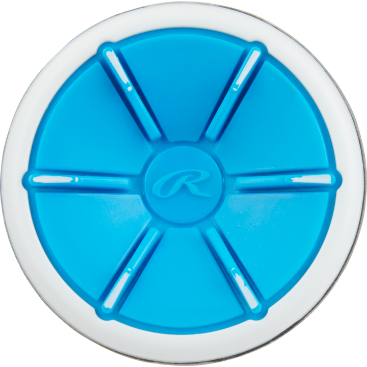 Round blue and white rubber puck featuring six raised lines in a wheel-like design, with an embossed R in the center that matches the Rawlings Mantra+ (-9) Fastpitch Softball Bat: RFP3MP9 style.