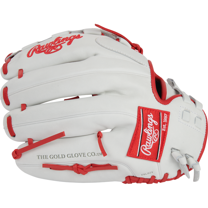 The Rawlings Liberty Advanced 12.5" Fastpitch Glove (RLA125-3S) is a white glove with red accents and stitching, featuring the Rawlings logo and "THE GOLD GLOVE CO. Est. 1887" text on the side.
