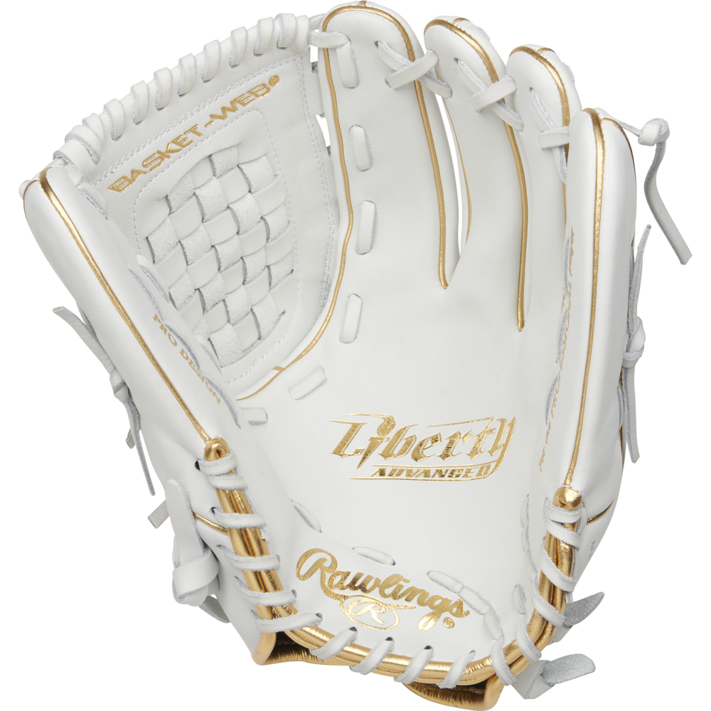 The Rawlings Liberty Advanced 12.5" Fastpitch Glove (RLA125KRG) features a white design with gold accents, detailed lacing, and "Liberty Advanced" plus Basket Web text on the palm and webbing.