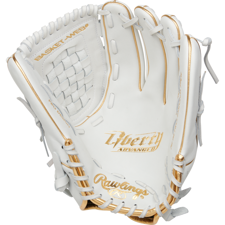 The Rawlings Liberty Advanced 12.5" Fastpitch Glove (RLA125KRG) features a white design with gold accents, detailed lacing, and "Liberty Advanced" plus Basket Web text on the palm and webbing.