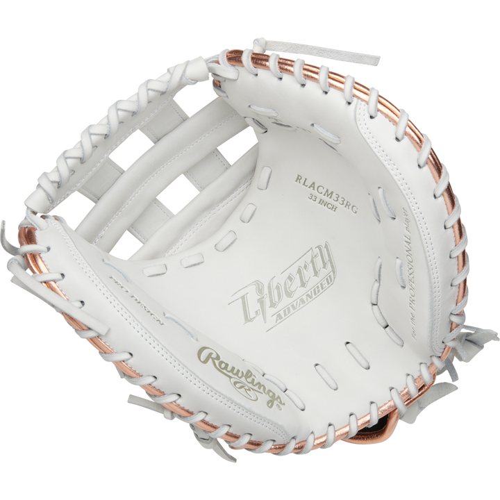 The Rawlings Liberty Advanced 33" Fastpitch Catcher's Mitt (RLACM33RG) is white with light gold and rose gold accents, featuring embossed Liberty Advanced and Rawlings logos on the palm.