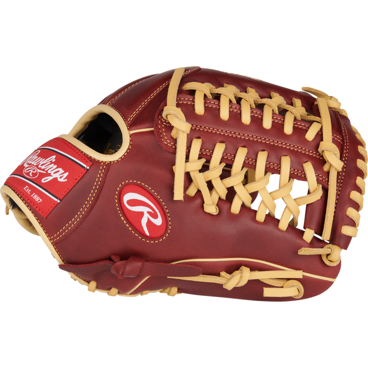 The Rawlings Sandlot 11.75" Baseball Glove (S1175MTS) features rich brown oiled leather with tan laces and showcases the Rawlings logo on the wrist strap.