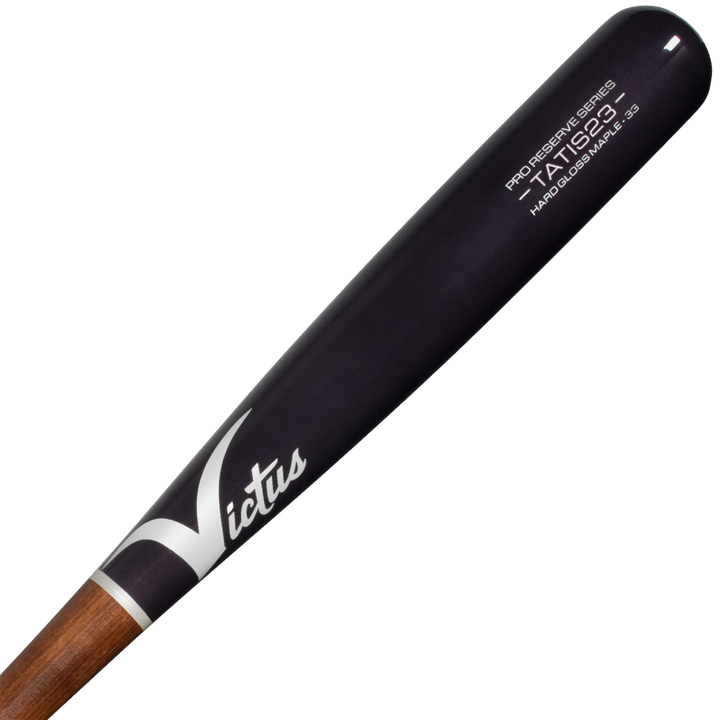 A close-up of the Victus TATIS23 Fernando Tatis Pro Reserve Maple Wood Bat (VRWMFT23) by Victus, showcasing its black and brown finish, white model details on the barrel, and premium end-loaded design.